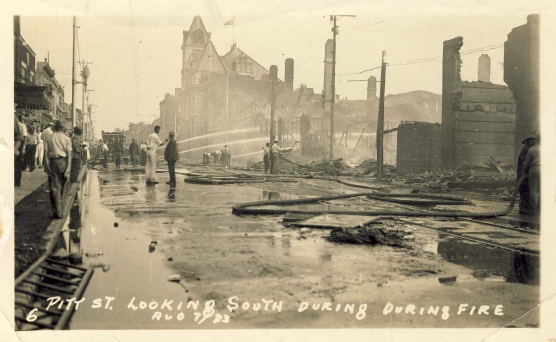 Pitt St. looking South during fire, Aug 7 / 33 postcard