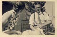Dr. Locke treating a stretcher patient, Williamsburg, Ontario  postcard