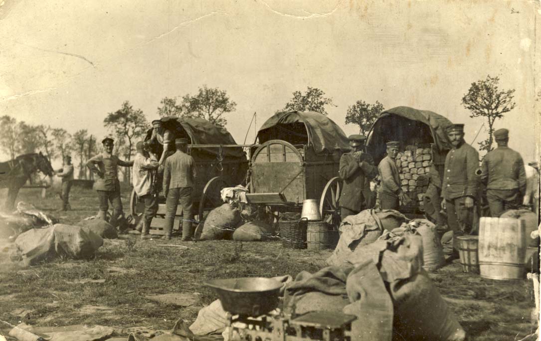 Bread wagons, European military men looking at camera photograph