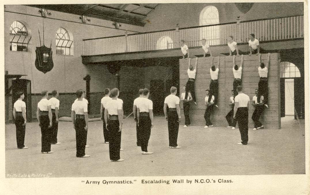 Army gymnastics: escalading wall by N.C.O.'s class postcard
