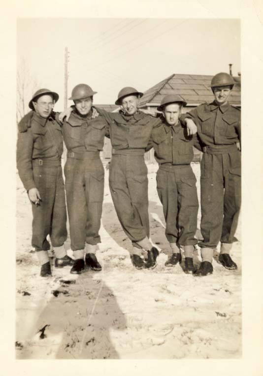 Group of five military men standing in the snow photograph