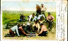 Cowboys shooting craps, 1904.